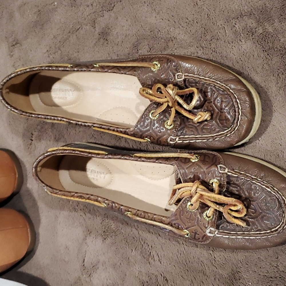 Sperry shoes .  Leather with anchor print. Light wear.